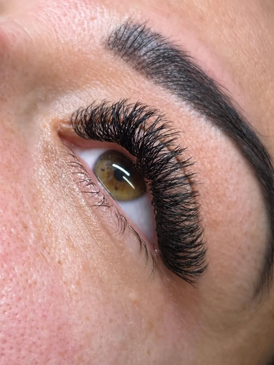 Full, fluffy lash set seen from below